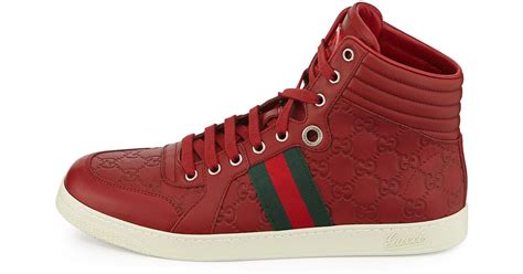 red gucci sneakers men's|gucci red high top.